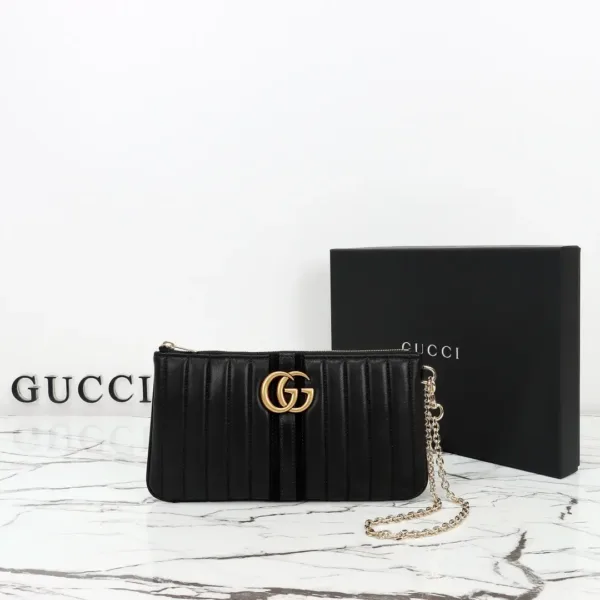 Gucci Matelassé Leather Clutch